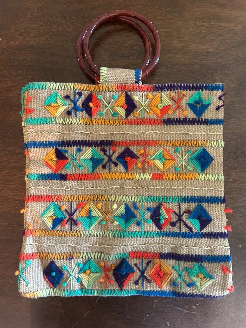 Vintage woven festival bag. Bakelite handle. Excellent vintage condition. Lined.
